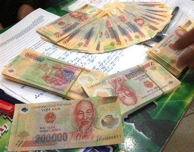 Hà Nội: Bắt hai đối tượng vận chuyển tiền giả 